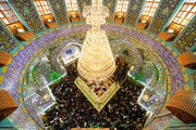 Photos: Crowds of pilgrims embrace holy shrine of Imam Ali on Eid al-Mab'ath