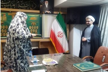 German woman embraces Islam at Imam Reza holy shrine on Eid of Mab’ath