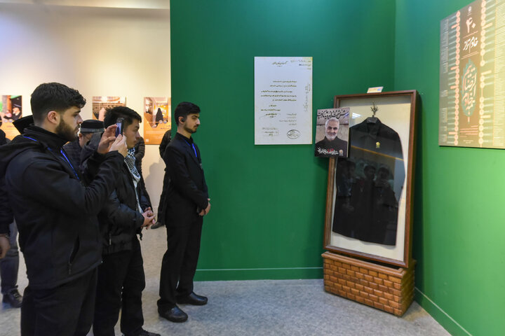 Photos: Participants of 41st Intl. Quran Competition visit Service Portico exhibition in Imam Reza shrine