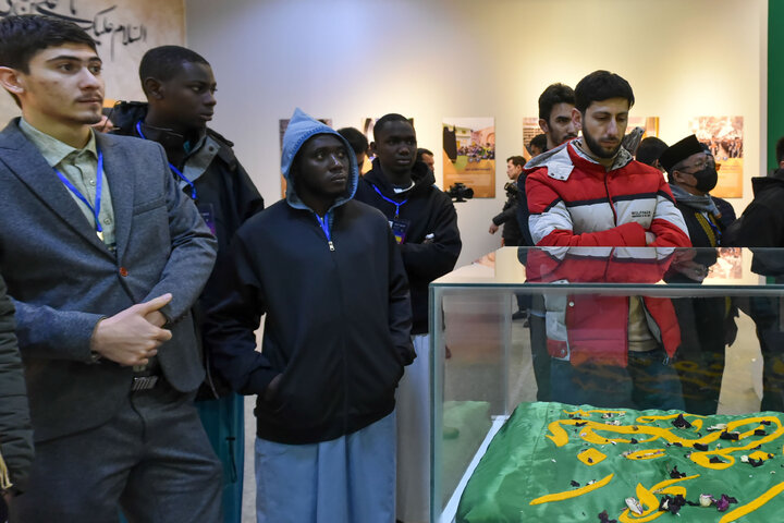 Photos: Participants of 41st Intl. Quran Competition visit Service Portico exhibition in Imam Reza shrine