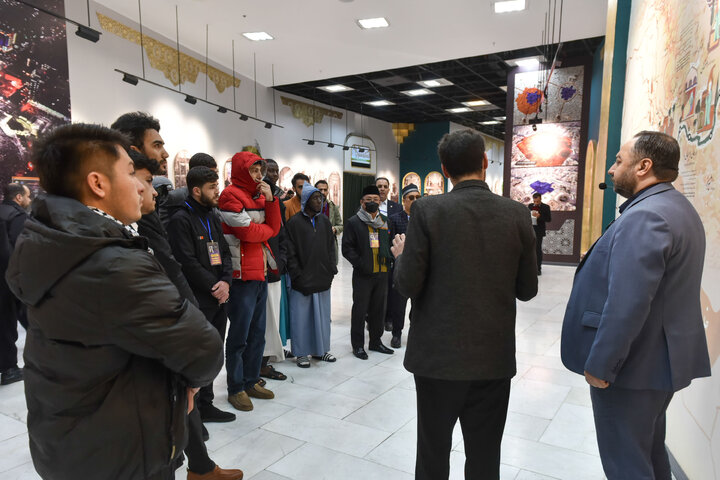 Photos: Participants of 41st Intl. Quran Competition visit Service Portico exhibition in Imam Reza shrine