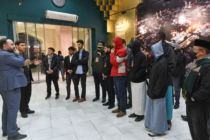 Photos: Participants of 41st Intl. Quran Competition visit Service Portico exhibition in Imam Reza shrine