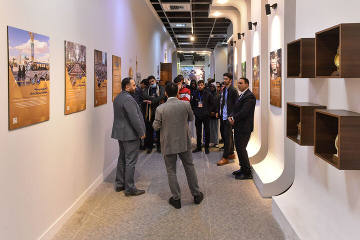 Photos: Participants of 41st Intl. Quran Competition visit Service Portico exhibition in Imam Reza shrine