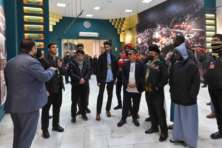 Photos: Participants of 41st Intl. Quran Competition visit Service Portico exhibition in Imam Reza shrine