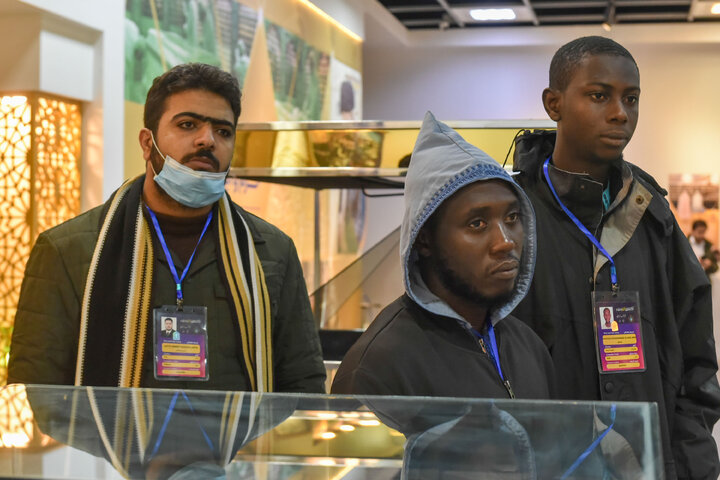 Photos: Participants of 41st Intl. Quran Competition visit Service Portico exhibition in Imam Reza shrine