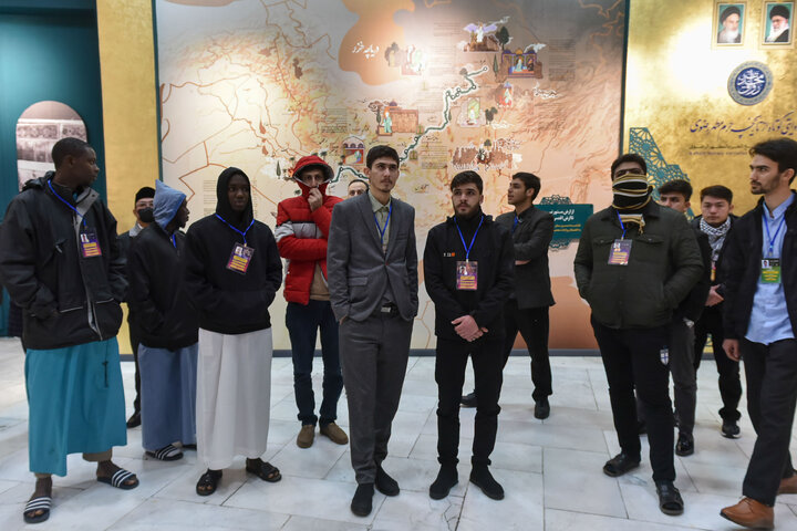 Photos: Participants of 41st Intl. Quran Competition visit Service Portico exhibition in Imam Reza shrine