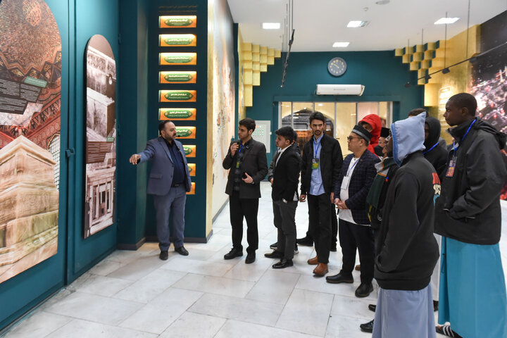 Photos: Participants of 41st Intl. Quran Competition visit Service Portico exhibition in Imam Reza shrine