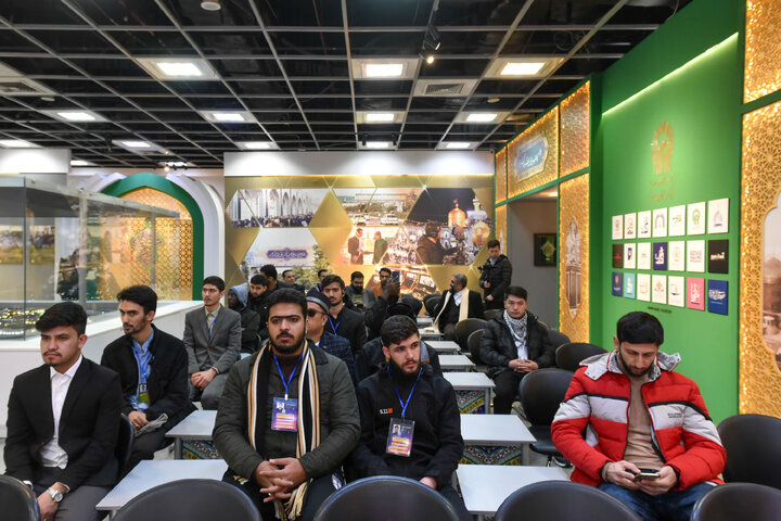 Photos: Participants of 41st Intl. Quran Competition visit Service Portico exhibition in Imam Reza shrine