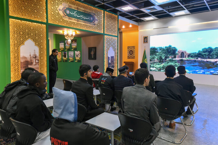 Photos: Participants of 41st Intl. Quran Competition visit Service Portico exhibition in Imam Reza shrine