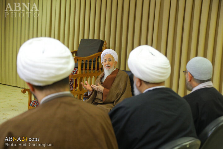 Photos: Flag of Imam Hussain shrine presented to Grand Ayatollah Javadi Amoli