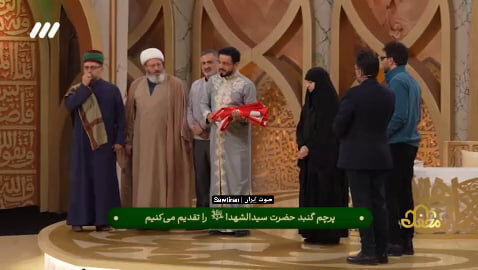 فيديو | اهداء الراية المقدسة لحرم الامام الحسين (ع) الى ابنة الشهيد السيد حسن نصر الله