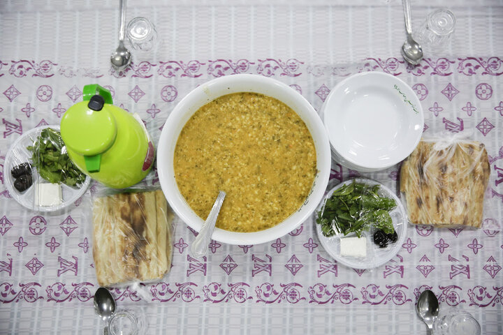 گزارش تصویری | سفره آسمانی به نیت شهدا