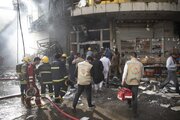 Al-Abbas holy shrine contributes to efforts to extinguish a fire broke out in a hotel in Karbala (+Photos)