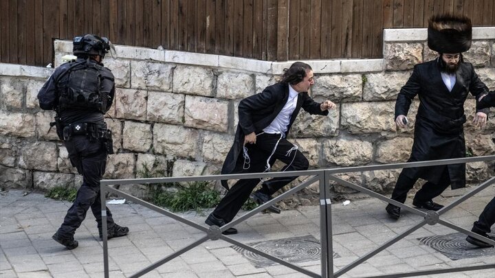 Rapora wêneyan |Hêzên ewlehiyê yên Îsraîlê bi cihûyên Haredî re şer dikin