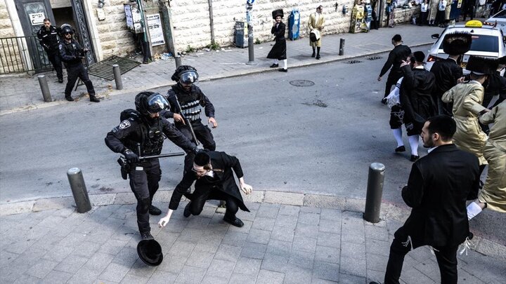 Rapora wêneyan |Hêzên ewlehiyê yên Îsraîlê bi cihûyên Haredî re şer dikin