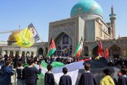 Schoolchildren chant in support of Gaza in Imam Reza holy shrine