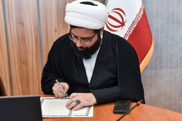 Photos: Astan Quds Razavi, Al-Mustafa Intl. University sign cooperation agreement