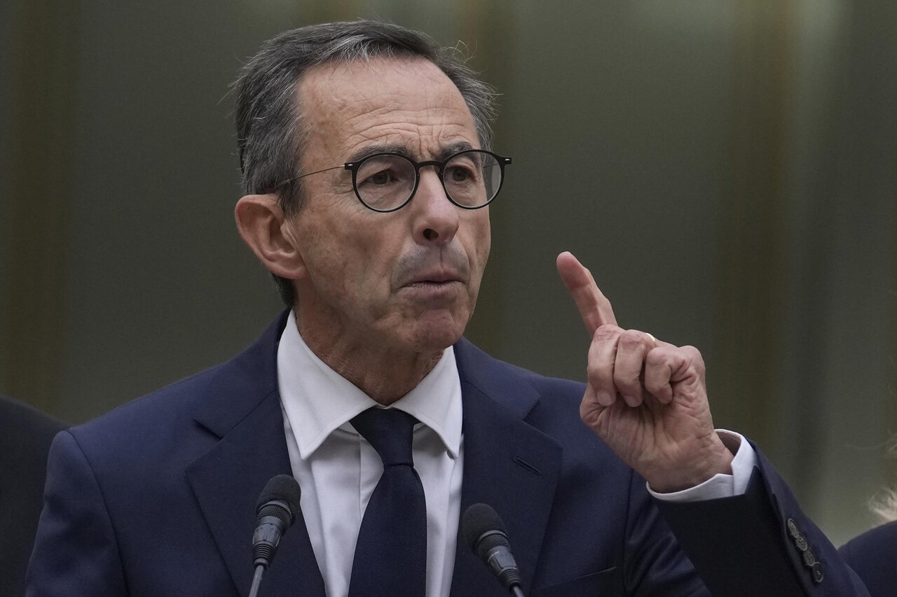 France's Interior Minister urges stricter rules on Hijab in universities