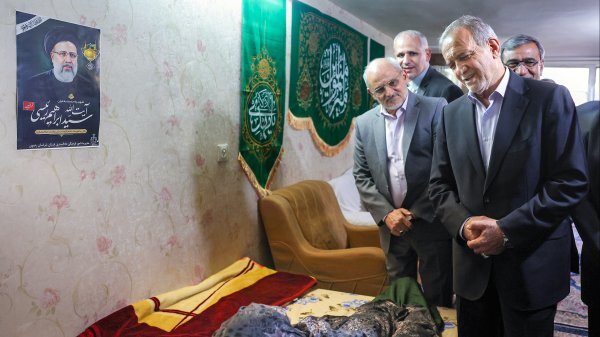 Iran President meets mother of Martyr Raisi