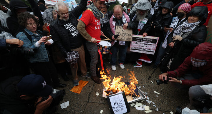 Pro-Palestine protesters torch diplomas outside Columbia Uni.