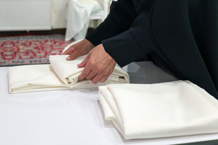 دوخت و اهدای ۲۰ چادر عروس توسط باشگاه اجتماعی گوهرشاد