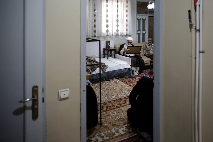 Photos: Custodian of Astan Quds Razavi meets with martyrs families