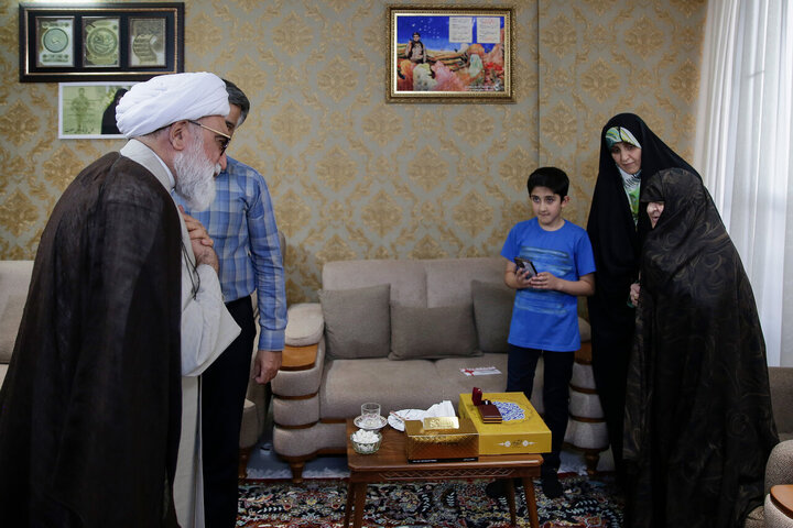 Photos: Custodian of Astan Quds Razavi meets with martyrs families