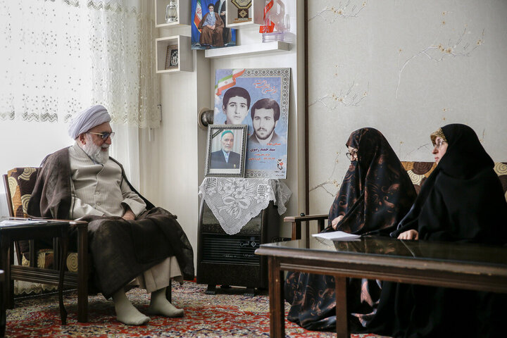 Photos: Custodian of Astan Quds Razavi meets with martyrs families