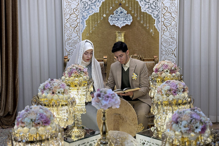 Photos: Young couples begin their life together at Hazrat Masoumeh shrine