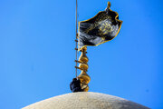 Photos: Mourning flag hoisted on Hazrat Masoumeh shrine dome on eve of Imam Baqir martyrdom anniversary