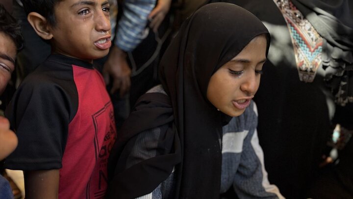 پیکر شهدای فلسطینی که برای دریافت کمک‌های بشردوستانه تجمع کرده بودند