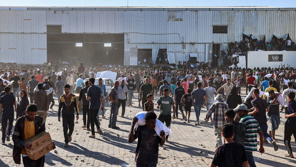 GHF temporarily shuts Gaza aid sites after deadly Israeli attacks