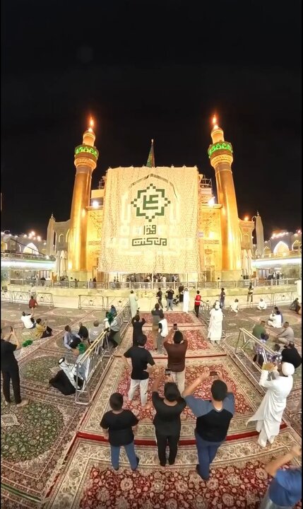 ویدیو | نصب کتیبه عید سعید غدیر بر ایوان حرم امیرالمومنین(ع)