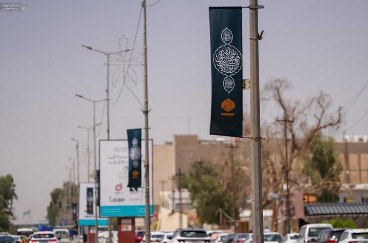 تقرير مصور/  نشر الآلاف من معالم الزينة والفرح في النجف الأشرف استعدادًا لإحياء أسبوع الغدير الأغر