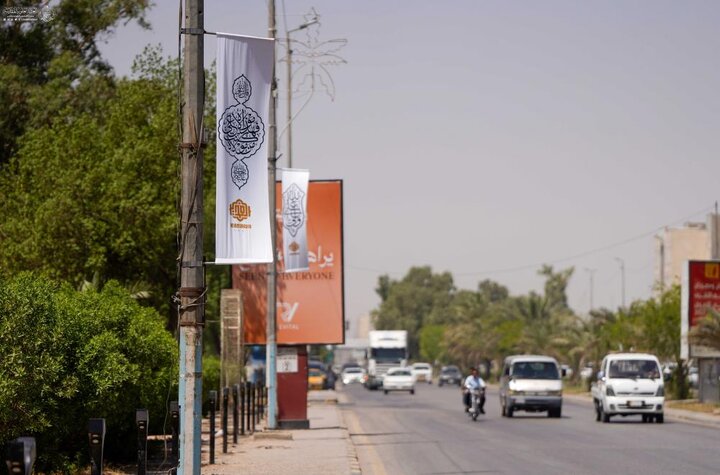 تقرير مصور/  نشر الآلاف من معالم الزينة والفرح في النجف الأشرف استعدادًا لإحياء أسبوع الغدير الأغر