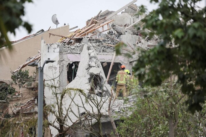 Photos: Massive destruction after Iranian missile hits south of Tel Aviv