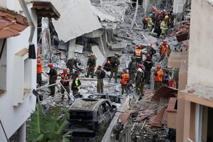 Photos: Massive destruction after Iranian missile hits south of Tel Aviv