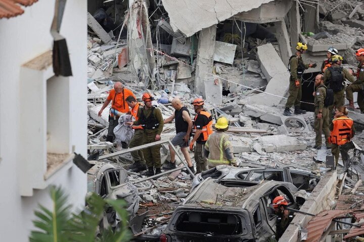 Photos: Massive destruction after Iranian missile hits south of Tel Aviv