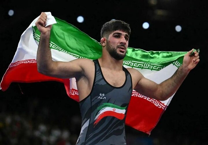 قهرمان المپیک: مردم ایران دفاع را برای خود مقدس می‌دانند