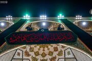 Photos: Imam Ali holy shrine covered in black on eve of Muharram