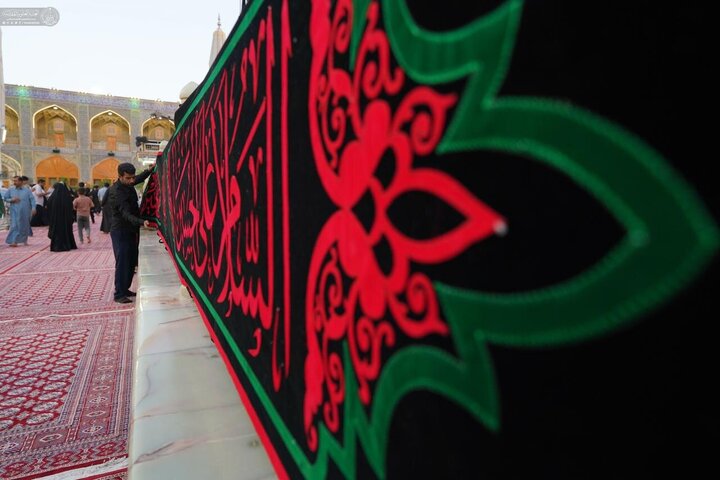 Photos: Imam Ali holy shrine covered in black on eve of Muharram