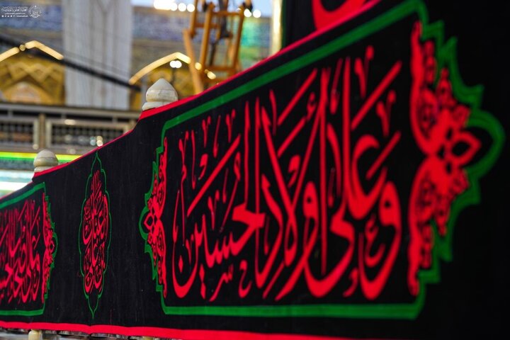 Photos: Imam Ali holy shrine covered in black on eve of Muharram