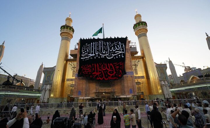 Photos: Imam Ali holy shrine covered in black on eve of Muharram
