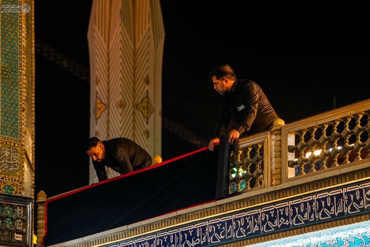Photos: Imam Ali holy shrine covered in black on eve of Muharram