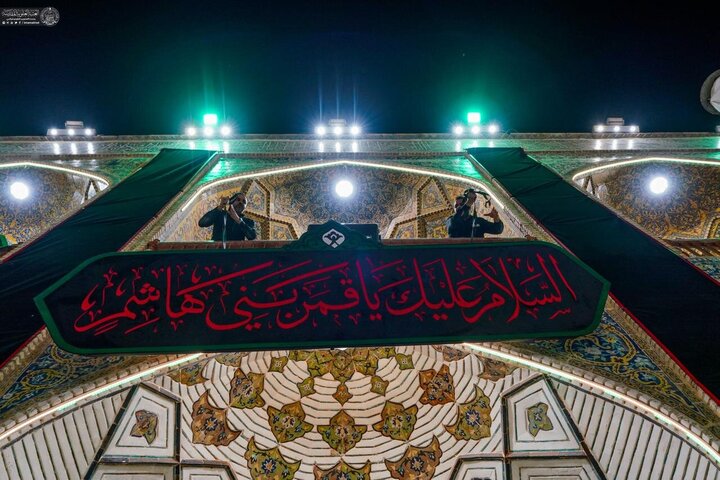 Photos: Imam Ali holy shrine covered in black on eve of Muharram