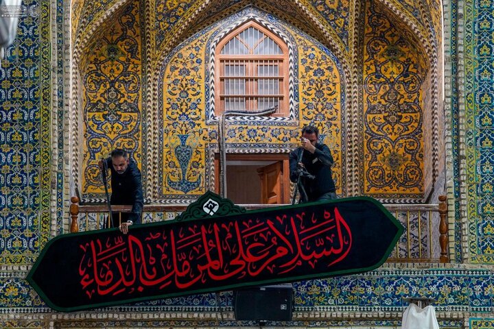 Photos: Imam Ali holy shrine covered in black on eve of Muharram