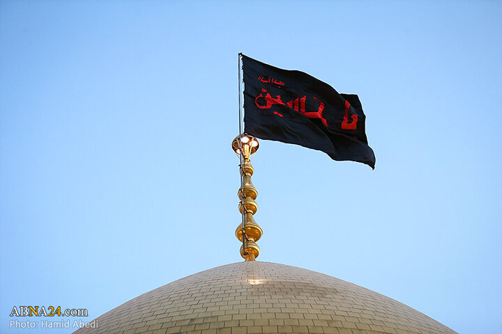 Photos: Changing flag of Hazrat Masoumeh shrine's dome ahead of Muharram