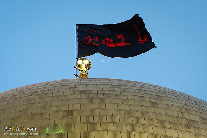 Photos: Changing flag of Hazrat Masoumeh shrine's dome ahead of Muharram