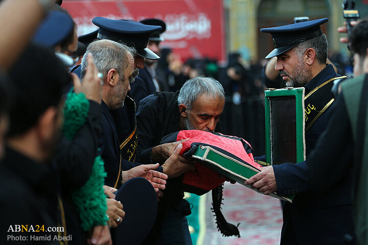 Photos: Changing flag of Hazrat Masoumeh shrine's dome ahead of Muharram