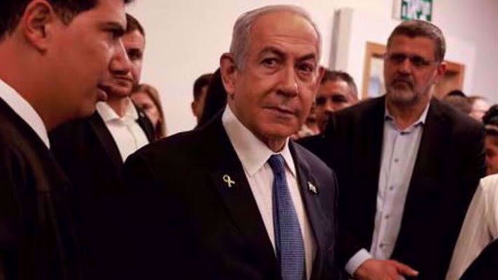 Netanyahu accused of using Gaza war to delay corruption trial